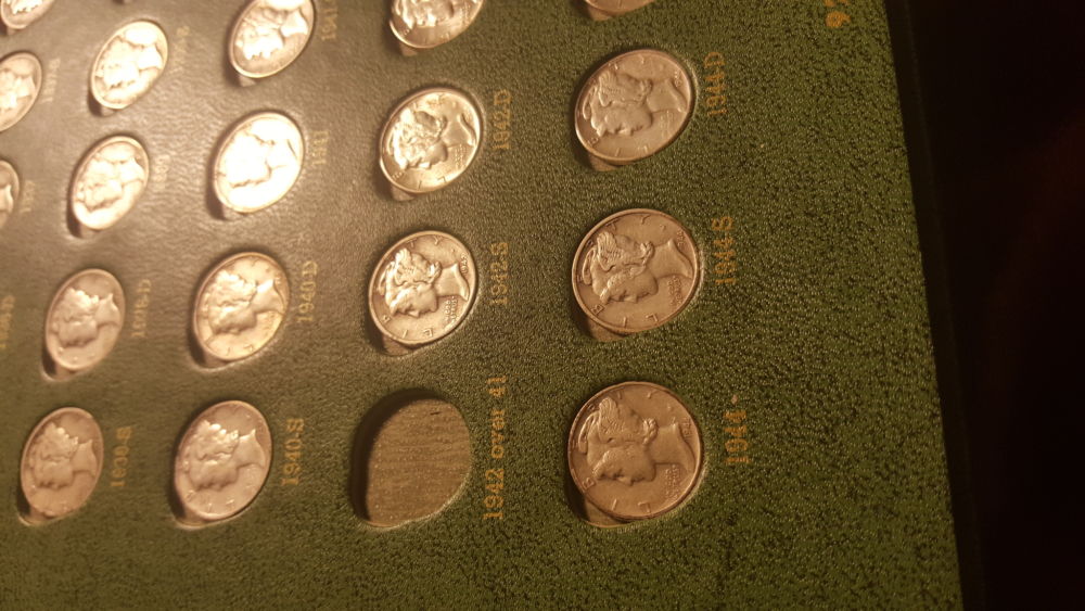 Removing-Coins-From-Green-Whitman-Folders
